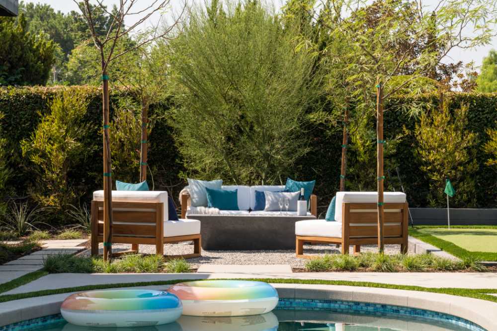 property brothers firepit and putting green