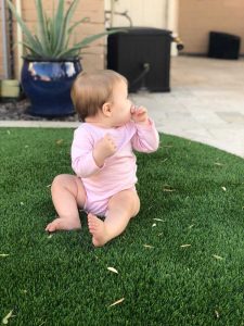 baby on artificial grass